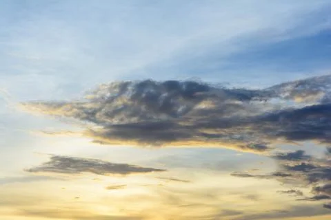 Rain clouds are gathering evening light from the sun as well. Stock Photos