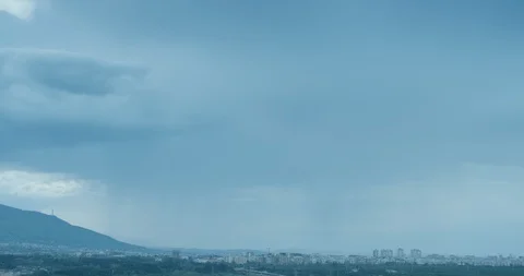 Rain clouds are moving over Sofia city-timelapse Stock Footage 129535031
