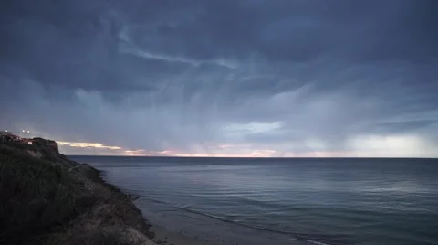 Rain clouds atop the ocean Video stock 58471015