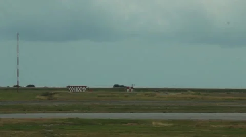 Rain Clouds in Background of Air Canada Airplane Taxiing on Airstrip Stock Footage 42115220