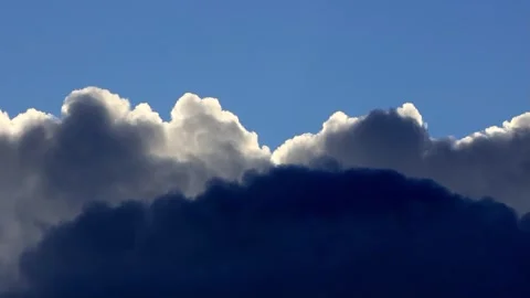 Rain clouds in the blue sky Stock Footage 244255034