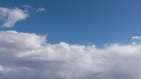 Rain Clouds In The Blue Sky At Sunset, Time Lapse Stock Footage 150768840