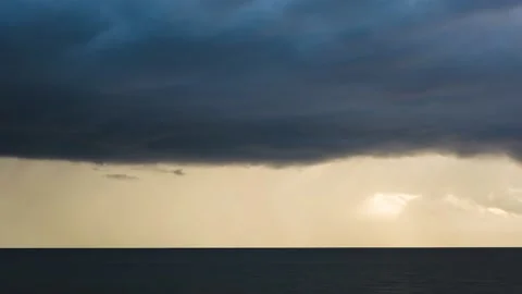 Rain Clouds Clear over water Stock Footage 132299870