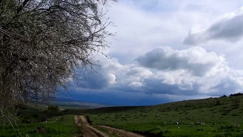 Rain clouds in the continental climate, fast moving rain clouds, timelapse ra Stock Footage 129858351