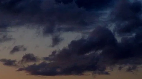 Rain clouds drifting across evening sky Stock Footage 41534170