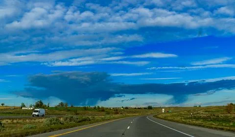 Rain clouds during the day over the plains in Oregon, USA Foto stock