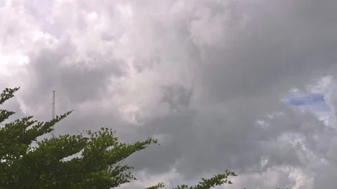 The rain clouds floated over the top of the radio station's antenna. Stock Footage 160750873