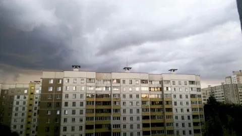 Rain clouds fly over the building, time lapse Stock Footage 133250154