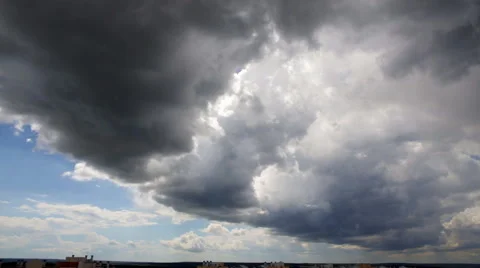 Rain clouds flying over the city. Stock Footage 64780714