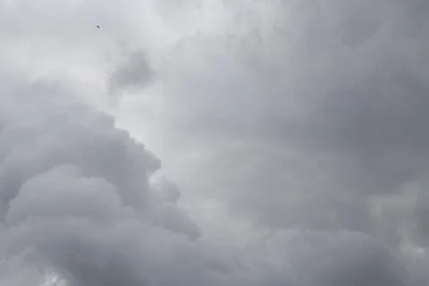 Rain clouds gather in a heap. Stock Photos