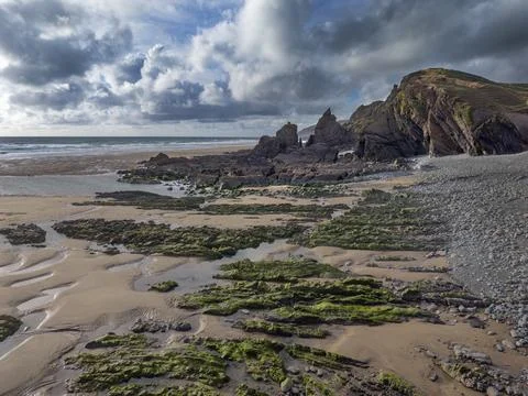 Rain clouds gathering on a summers evening on a Cornish beach Foto stock