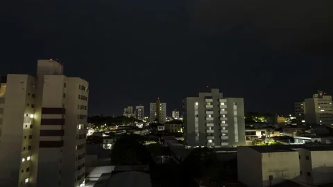 Rain clouds loaded with lightning and lightning arrive in the city of Marília Video stock 225743323