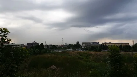 Rain clouds move fast on the grass on a rainy day. Stock Footage 112369738