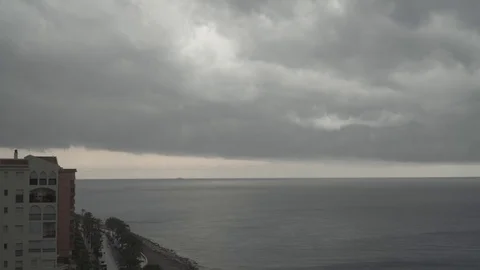 Rain clouds moving above the sea in thunderstorm. Timelapse Stock Footage 81309411