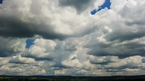 Rain clouds moving fast over blue sky. Taimlapse. Stock Footage 36763270