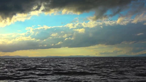 Rain Clouds Moving Over the Ocean in Spring Stock Footage 307146857