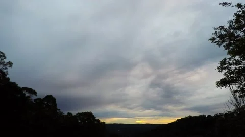 Rain Clouds Moving Through the Valley at Sunset  Stock Footage 65481113