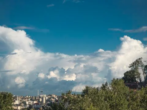 Rain clouds over the city Stock Photos