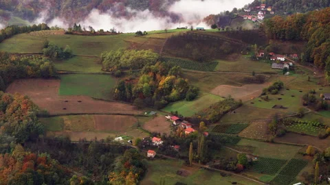 Rain clouds over the forests and village. Hill mountains in Serbia. Stock Footage 256163858