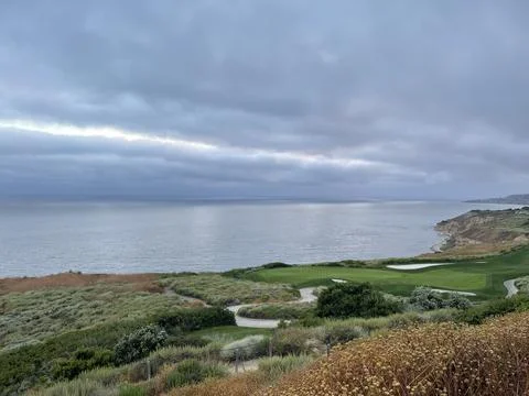 Rain Clouds Over Golf Course Cliffside on the Pacific Ocean in California Photos