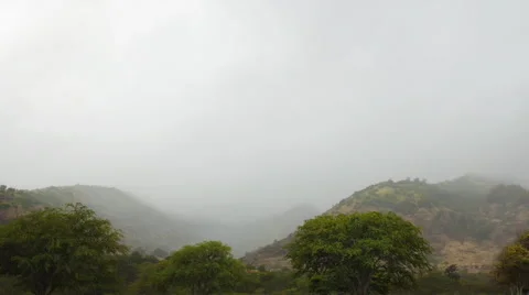 Rain clouds over hill Stock Footage 51639752