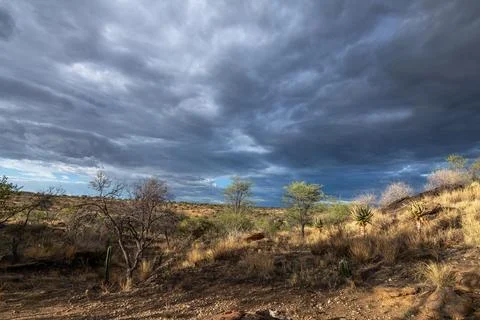 Rain clouds over the Khomas Highlands, Namibia Stock Photos