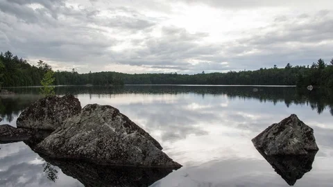 Rain clouds over lake Video stock 100138576