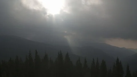 Rain Clouds Over The Mountains And Rays Of Sun, Timelapse. 스톡 동영상 105230183
