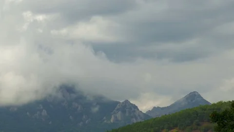 Rain clouds over mountains Stock Footage 79448142