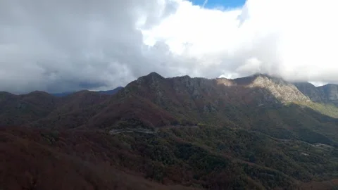Rain clouds over the mountains Stock Footage 153513093