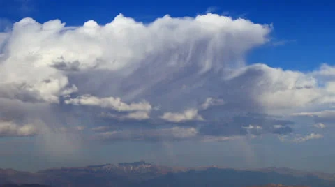 Rain clouds over the mountains, time lapse Видео 25159524