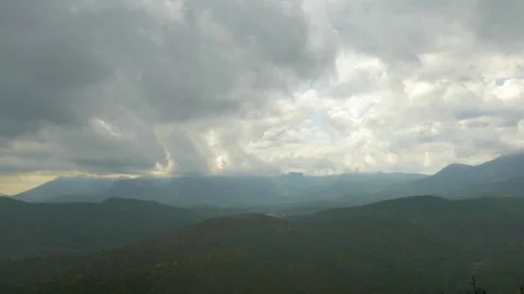 Rain clouds over mountains, time lapse Stock Footage 79444073