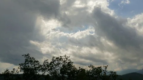 Rain clouds over mountains, time lapse Video stock 79446078