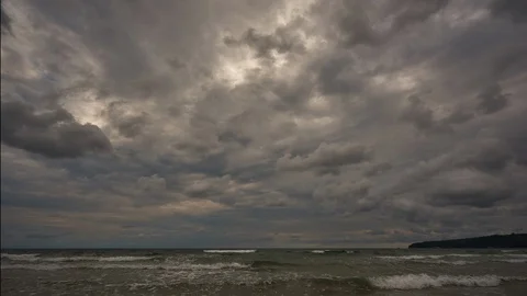 Rain clouds over the sea Stock Footage 116590979