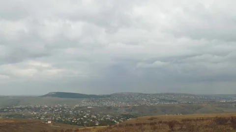 Rain clouds over small town, time lapse Stock Footage 81373441