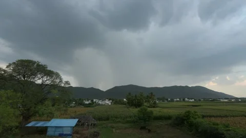Rain Clouds Rolling Over Mountain Peaks - Cinematic Timelapse Stock Footage 313188743