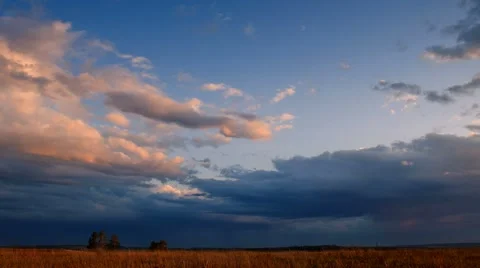 Rain clouds running over blue sky, time lapse. Stock Footage 48248662