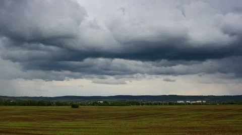 Rain clouds running over field Stock Footage 50449121