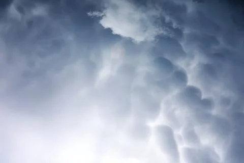 Rain clouds in the sky. Gray dark clouds in the sky. Storm clouds. Stock Photos