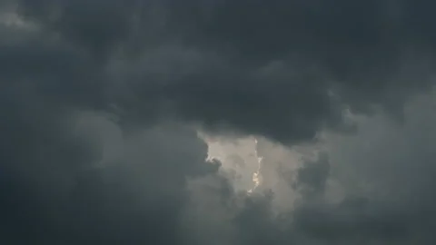 Rain clouds. the sun breaks through the clouds. Lighting in dark stormy cloudy Stock Footage 159132332