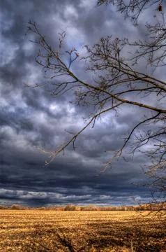 Rain clouds, sun rays, twilight, stormy sky Foto stock