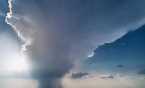 Rain clouds with sunlight Stock Photos