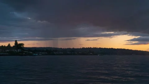 Rain clouds with sunset timelapse Stock Footage 237718170