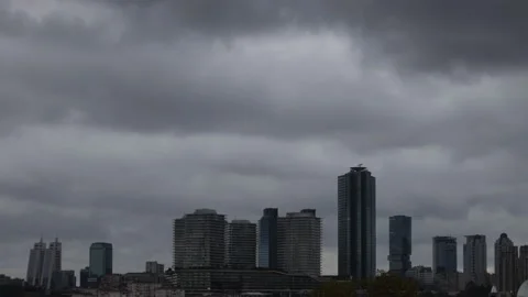Rain clouds timelapse on a business center Stock Footage 219936147