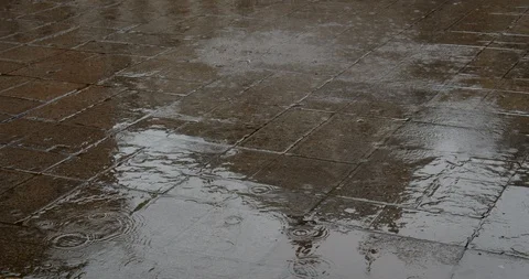 Rain on Concrete with reflection Stock Footage 129789836