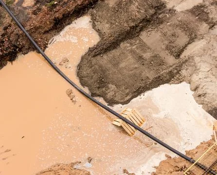 Rain. Construction. Puddles. Mud. View from above. 스톡 사진