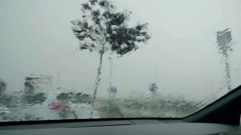 Rain Covered Windshield With Blurred Outdoor View Stock Footage 346036746