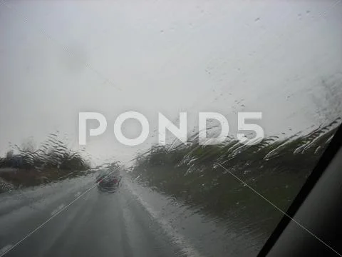 Rain covered windshield Stock Photos