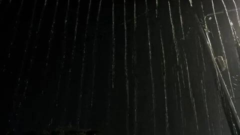 Rain Curtain Falling in Pitch Black Night Background Stock Footage 334766466