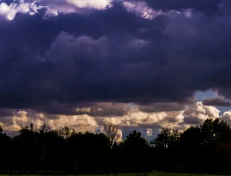 Rain dark clouds are moving very quickly. 4k ultra hd video. Stock Footage 12576630